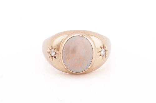 Lot 327 - An opal and diamond ring; the central oval...