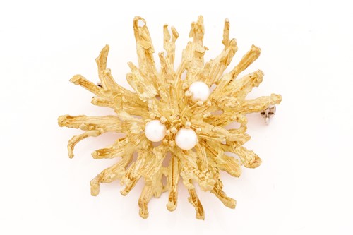 Lot 23 - An 18 carat gold and cultured pearl abstract...
