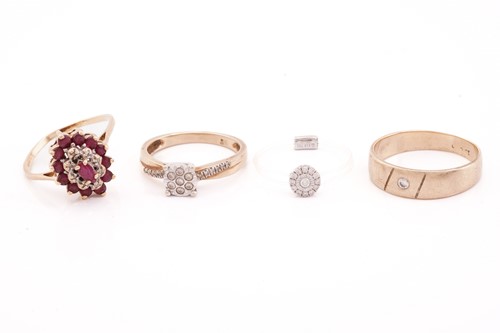 Lot 314 - Four gem-set rings; to include a 9ct yellow...