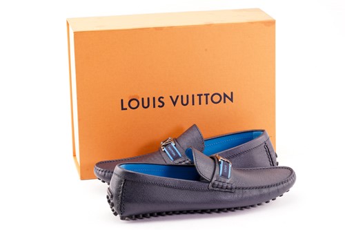 Lot 397 - A pair of Louis Vuitton Hockenheim blue...