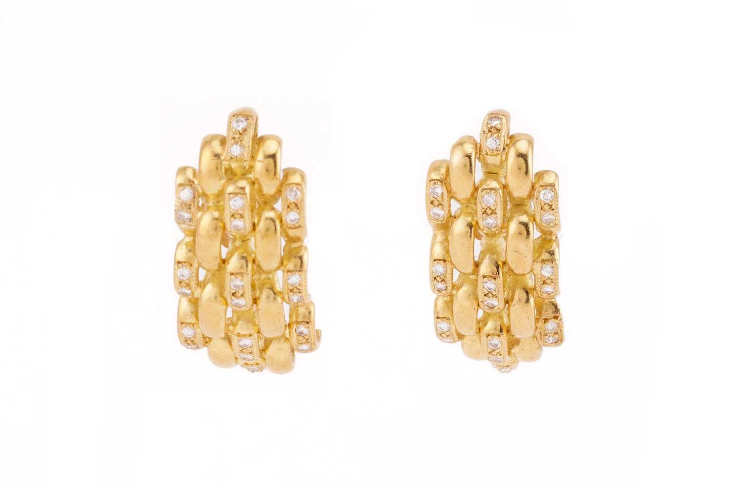 Lot 62 - A pair of 18ct yellow gold and diamond...