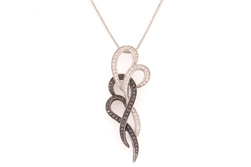 Lot 157 - A white and black diamond pendant on chain, of...