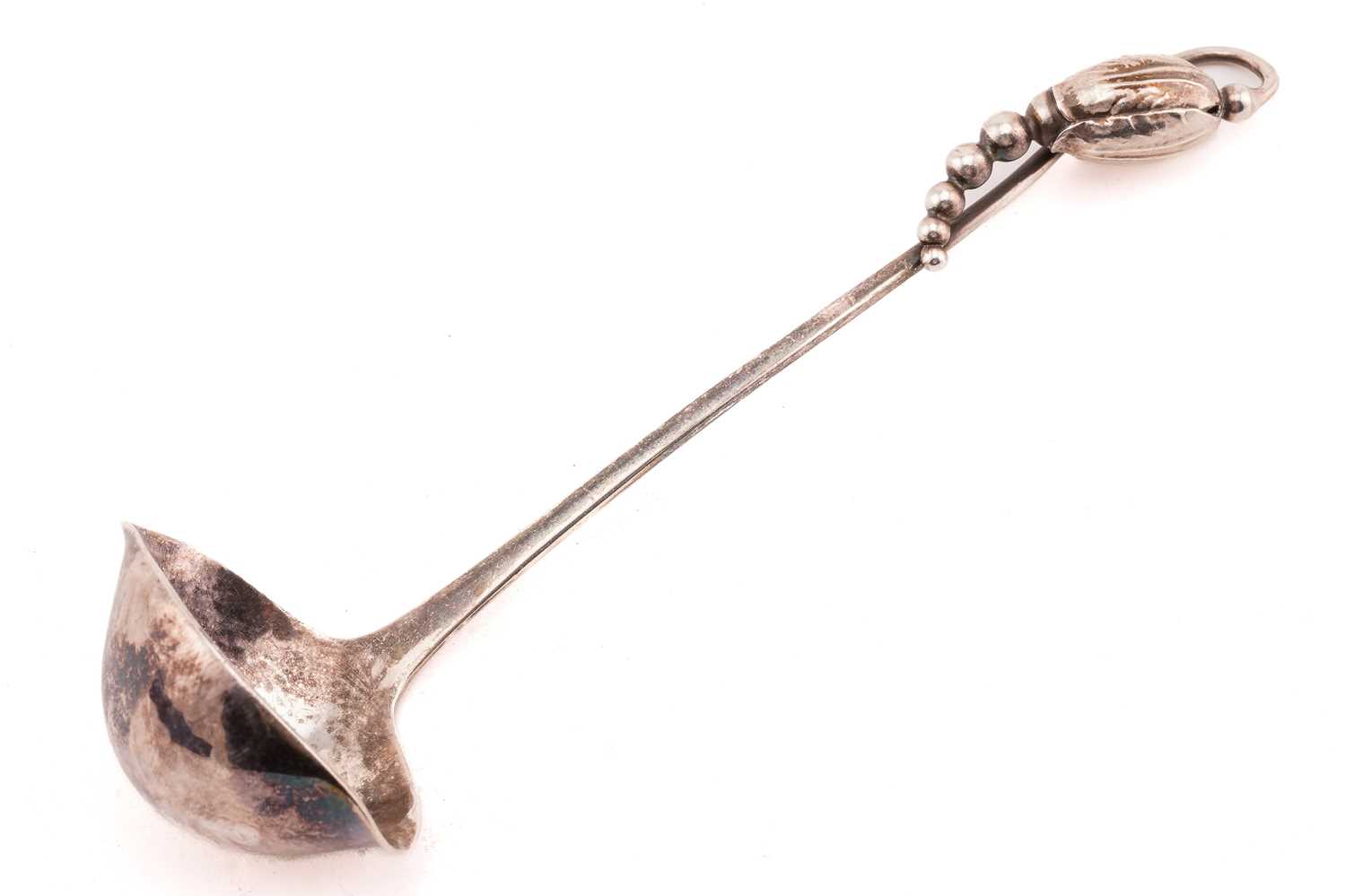 Lot 376 - A Georg Jensen small sauce ladle, GI mark