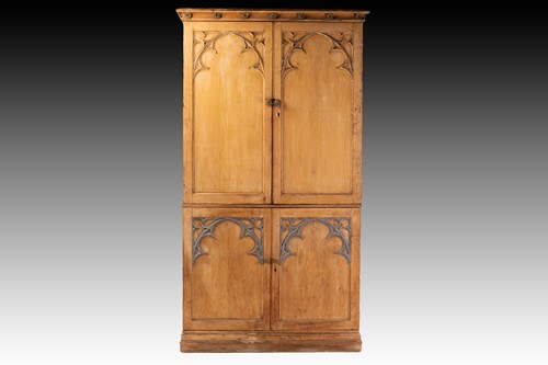 Lot 162 - A large Victorian stripped gothic linen press...