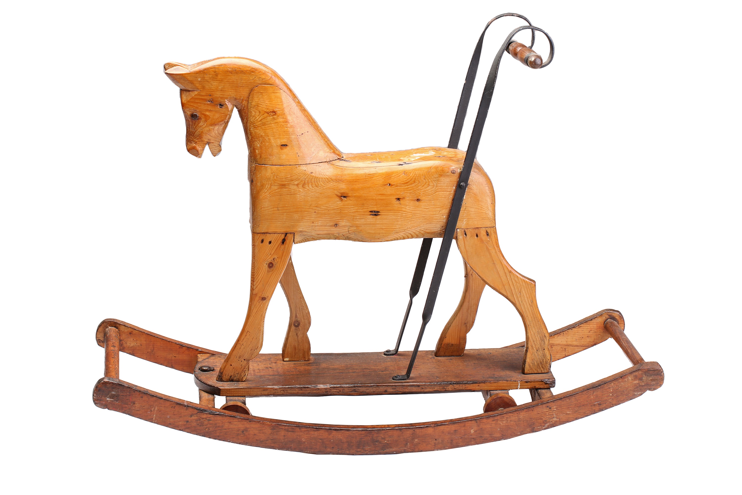 Lot 176 - A folk-art carved pine rocking/push-along