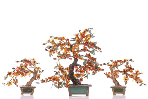 Lot 256 - A garniture of Chinese ornamental Bonsai trees,...