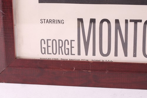 Lot 417 - A framed and perspex glazed original quad film...
