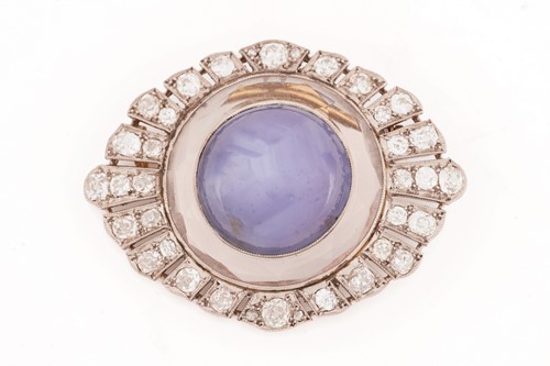 Lot 276 - Star sapphire and diamond brooch, circa 1920,...