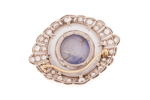 Lot 276 - Star sapphire and diamond brooch, circa 1920,...