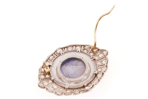 Lot 276 - Star sapphire and diamond brooch, circa 1920,...