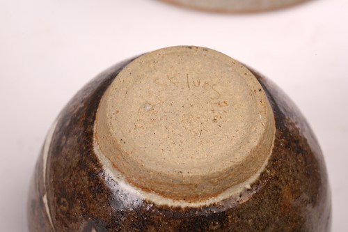Lot 670 - A Studio pottery spiral form vase, possibly by...