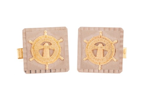 Lot 67 - A pair of yellow gold cufflinks, the panels...