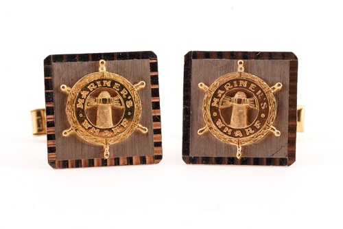 Lot 67 - A pair of yellow gold cufflinks, the panels...