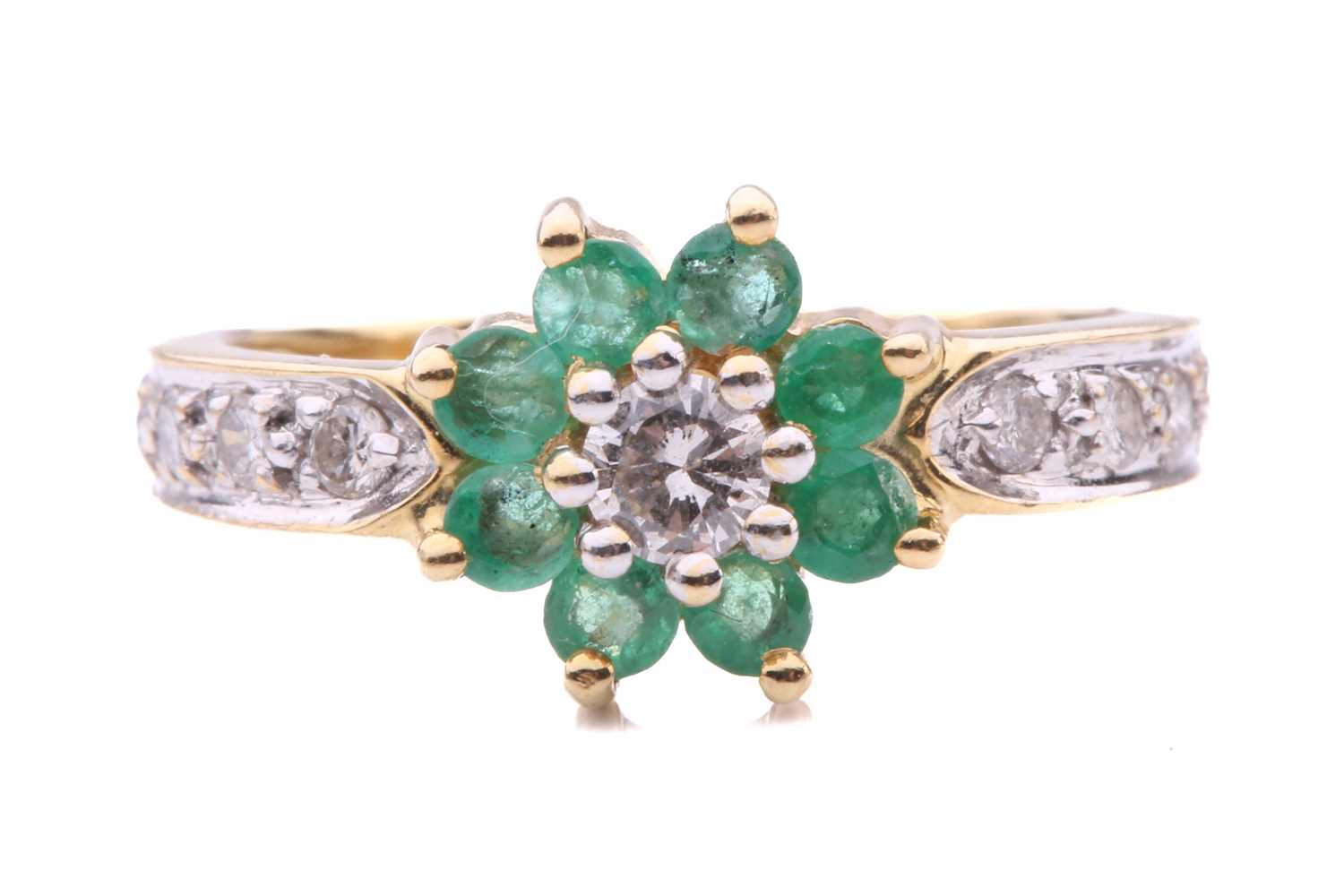 Lot 26 - An emerald and diamond cluster ring; the seven...