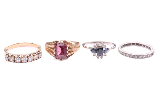 Lot 104 - A collection of four rings comprising a 9ct...