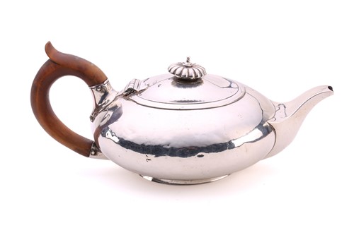 Lot 327 - A George IV silver teapot, the lid with a...