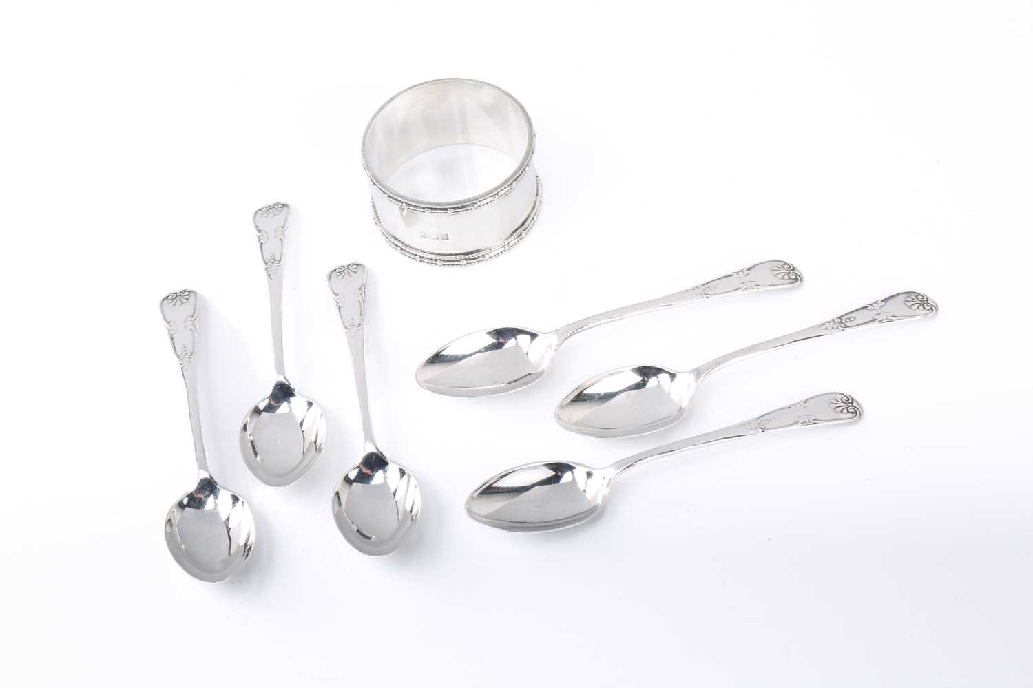 Lot 366 - A set of six George V silver teaspoons, with...