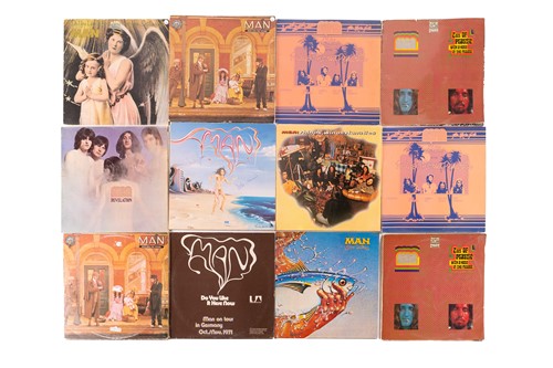 Lot 76 - Man: fifteen original vinyl LPs comprising a...