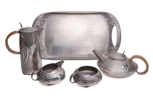 Lot 333 - An Arts & Crafts "Tudric" pewter for Liberty &...