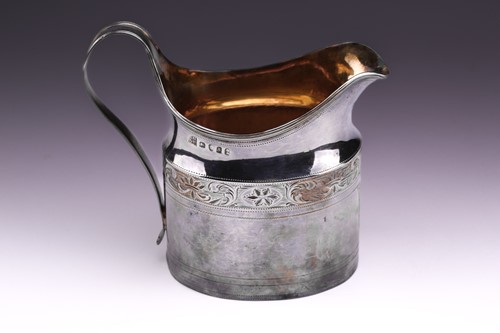 Lot 353 - A matched four-piece George III silver tea set,...