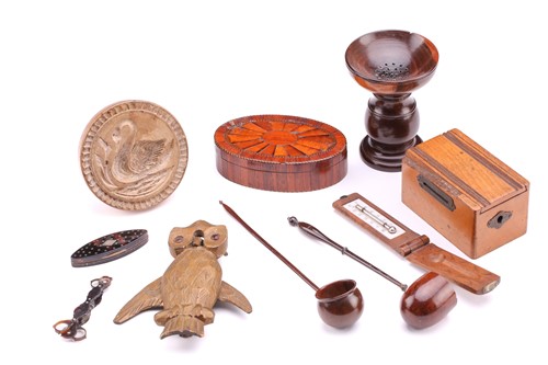 Lot 639 - A collection of treen items including an...