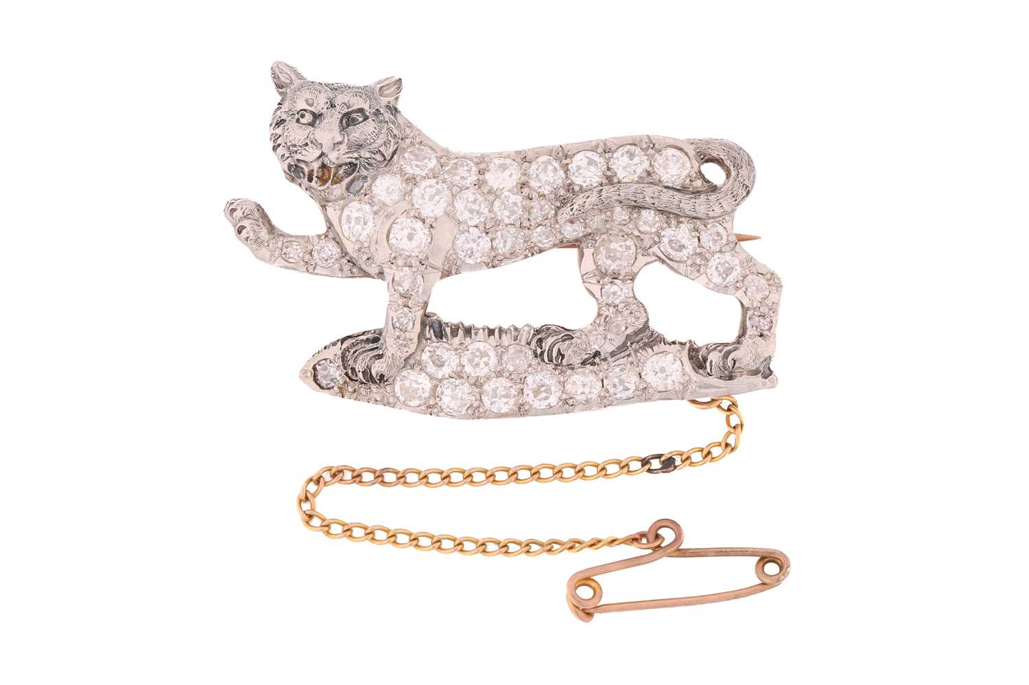 Lot 245 - A tiger passant diamond brooch, the walking...