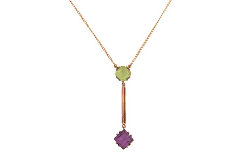 Lot 131 - A lavalier necklace set with green and purple...