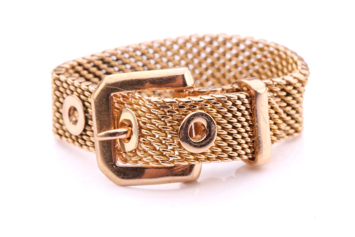 Lot 124 - An adjustable belt and buckle ring, with a...