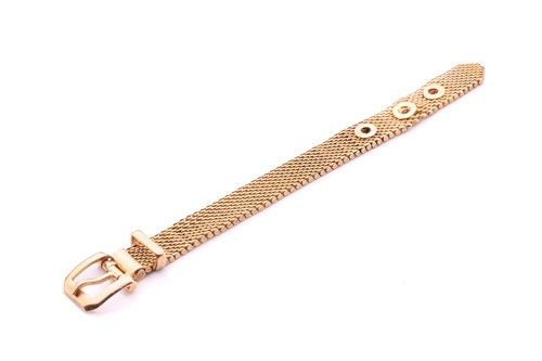 Lot 124 - An adjustable belt and buckle ring, with a...
