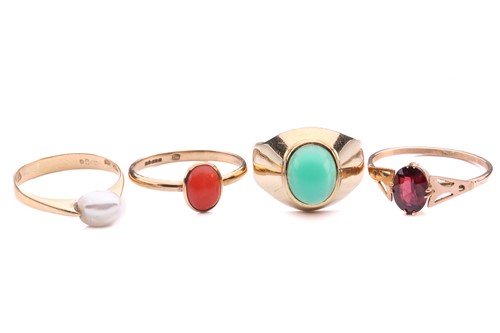 Lot 292 - A collection of four gem set rings, featuring...