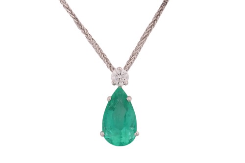 Lot 170 - An emerald and diamond pendant on chain,...