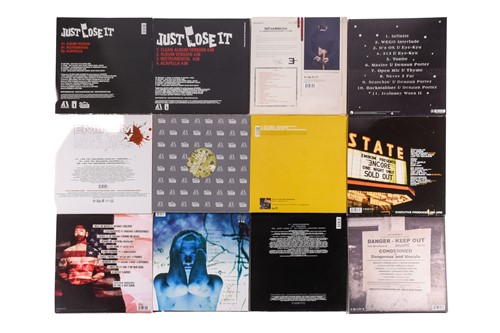 Lot 158 - Eminem: thirty-two original vinyl records,...