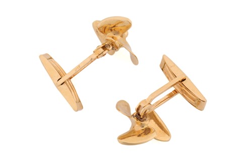 Lot 153 - A pair of boat propeller cufflinks, with...