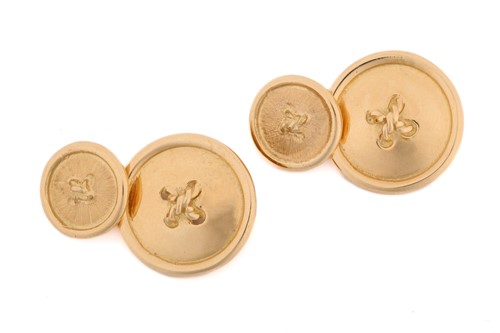 Lot 179 - A pair of flat sew-through button cufflinks,...