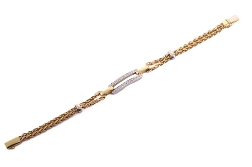 Lot 140 - A two-tone bracelet set with diamonds,...