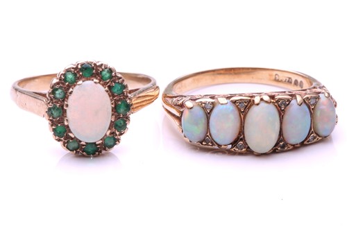 Lot 189 - A five-stone half hoop graduated opal ring;...