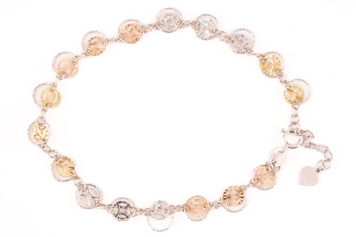 Lot 95 - A three-tone 'Prosperity' bracelet, by Lukfook...