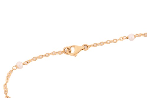 Lot 182 - A mother-of-pearl zodiac necklace by Peggy...