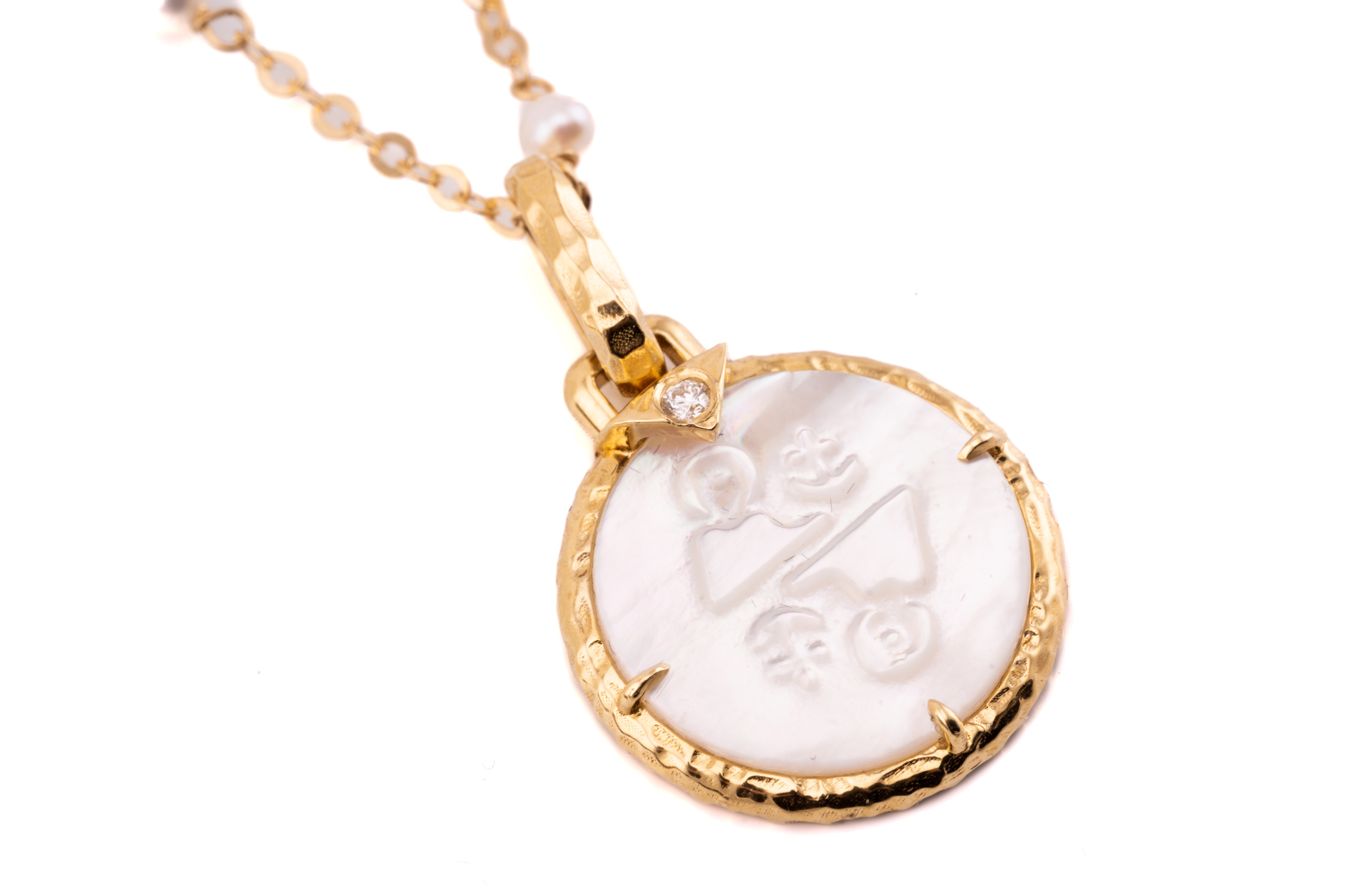 Lot 182 A motherofpearl zodiac necklace by Peggy