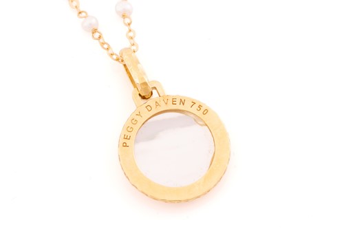 Lot 182 - A mother-of-pearl zodiac necklace by Peggy...