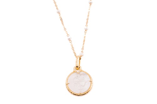 Lot 182 - A mother-of-pearl zodiac necklace by Peggy...