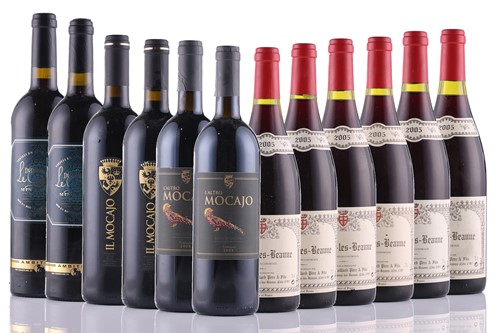 Lot 585 - Twelve bottles of assorted red wine,...