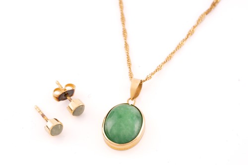 Lot 57 - A jade pendant on chain with a pair of stud...
