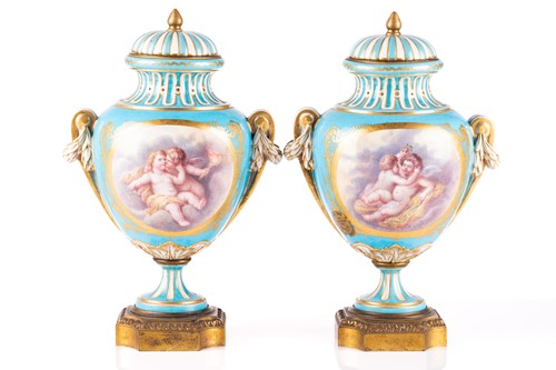 Lot 572 - A pair of Sevres bleu celeste style porcelain...