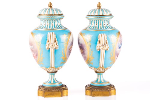 Lot 572 - A pair of Sevres bleu celeste style porcelain...