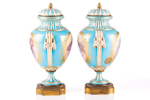 Lot 572 - A pair of Sevres bleu celeste style porcelain...