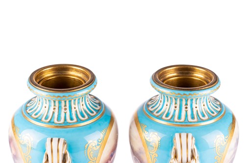 Lot 572 - A pair of Sevres bleu celeste style porcelain...