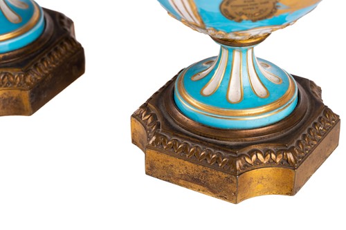 Lot 572 - A pair of Sevres bleu celeste style porcelain...
