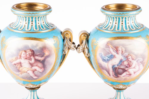 Lot 572 - A pair of Sevres bleu celeste style porcelain...