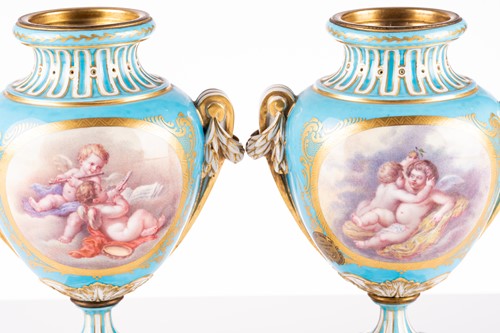 Lot 572 - A pair of Sevres bleu celeste style porcelain...